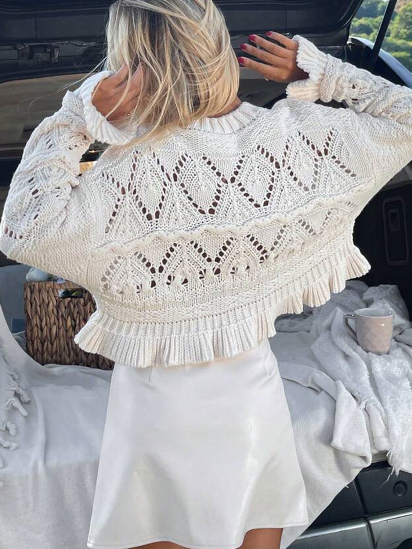 Fashionable white crocheted hollow knit sweater for women Round neck long sleeves short style ruffled hem lazy style top